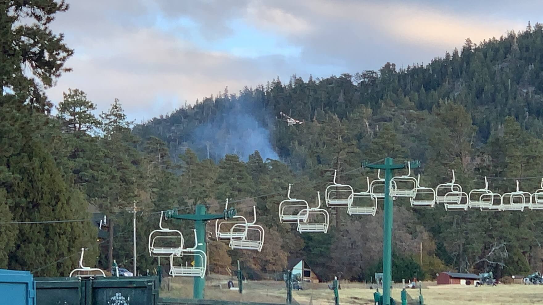 Helicopter dropping water on Bear Mountain